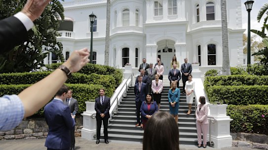 Queensland Premier Annastacia Palaszczuk and her newly sworn-in cabinet pose for photos on the steps of Government House with Governor Paul de Jersey after winning the 2020 Queensland election.