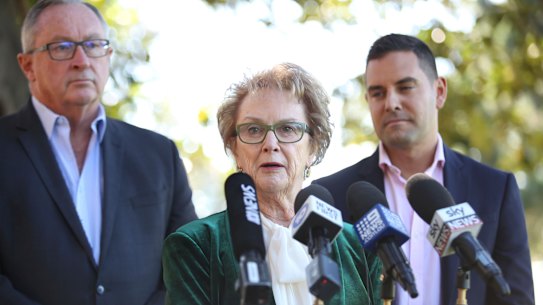 Chair of the NSW Pro-Choice AllianceWendy McCarthy (centre) with Health Minister Brad Hazzard, and Independent MP Alex Greenwich announcing the Reproductive Health Reform Bill 2019.