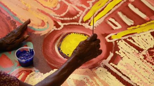 Jakayu Biljabu at work at Martumili Artists East Pilbara Art Centre in WA. 