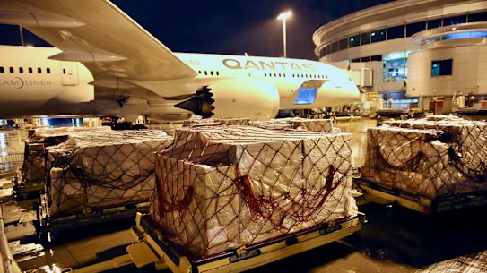 COVID-19 supplies for India being loaded into a Qantas plane earlier this week.
