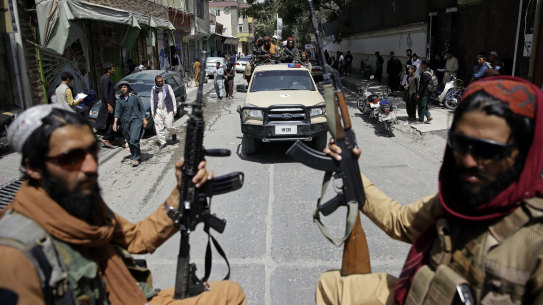 Taliban fighters patrol the streets of Kabul after their takeover.  