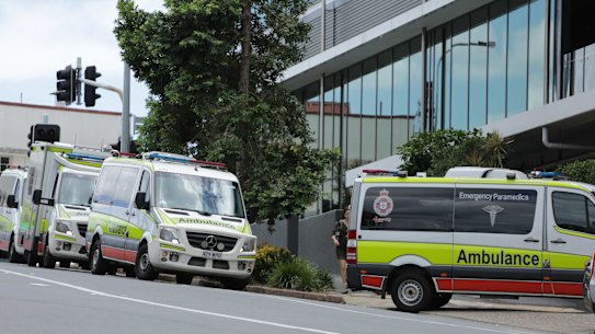Ambulances ready to transport hotel quarantine guests from the Hotel Grand Chancellor.