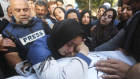 Al Jazeera journalist Wael Dahdouh (left) mourns his son Hamza.
