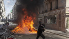 Protesters clash with riot police during May Day demonstrations in Paris, France.