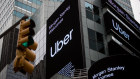 Monitors display Uber Technologies Inc. signage in front of Morgan Stanley headquarters in Times Square, New York.