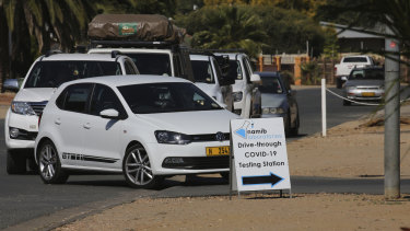 Cars queue at a COVID-19 testing centre in Windhoek, Namibia.
