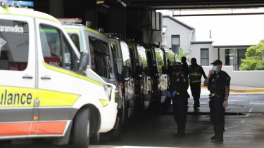 Ambulances at the ready to transport hotel quarantine guests from the Hotel Grand Chancellor in Brisbane on Wednesday.
