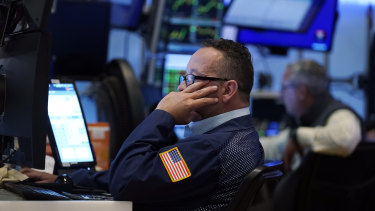 Wall Street slid lower for the week but still was up for the month.