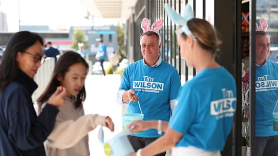 Tim Wilson hands out Easter eggs outside Woolworths in Moorabbin.