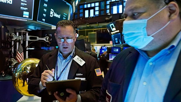 Wall Street was sharply lower at lunch but pared some of its losses in the afternoon.