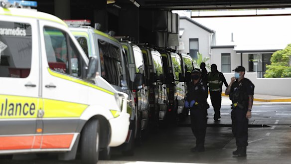 Ambulances at the ready to transport hotel quarantine guests from the Hotel Grand Chancellor in Brisbane on Wednesday.
