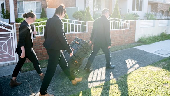 Evidence is taken out of NSW Labor Minister Shaoquett Moselmane's property in Rockdale after raids by ASIO as part of investigation into possible links to the Chinese Communist Party.