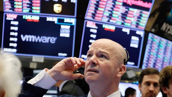 Wall Street edges up in volatile trade day