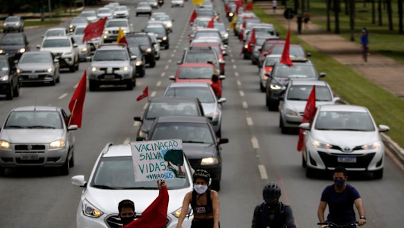 A caravan in protest against the government’s response in combating COVID-19 in Brasilia, Brazil. 