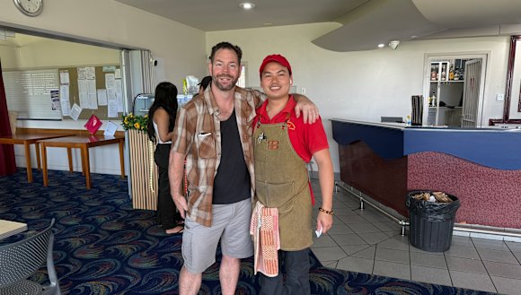 Mr Bill - real name Loc Nguyen - with one of his loyal customers, Brendan Field.