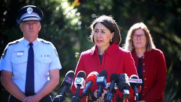 Premier Gladys Berejiklian, with NSW Police Commissioner Mick Fuller and chief health office Kerry Chant, has taken the unprecedented step of closing the NSW-Victoria border.