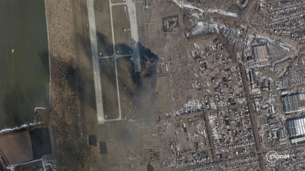Rising smoke is visible from the Chuhuiv Airbase outside of Kharkiv, Ukraine.