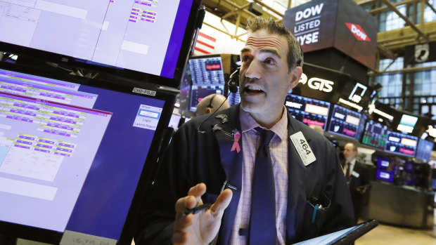 The S&P and Nasdaq inched higher but the Dow finished in the red on the first trading day of the week. 