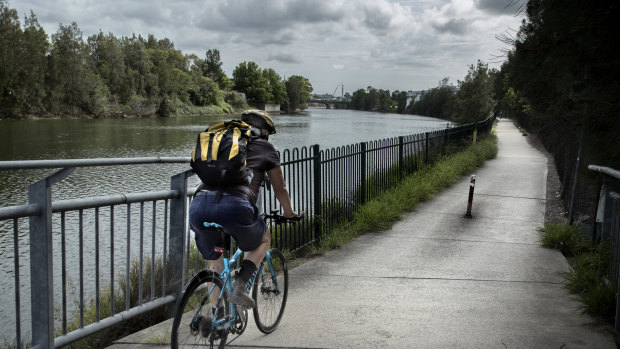 A rider on the Alexandra Canal Cycleway, which is set to be closed.