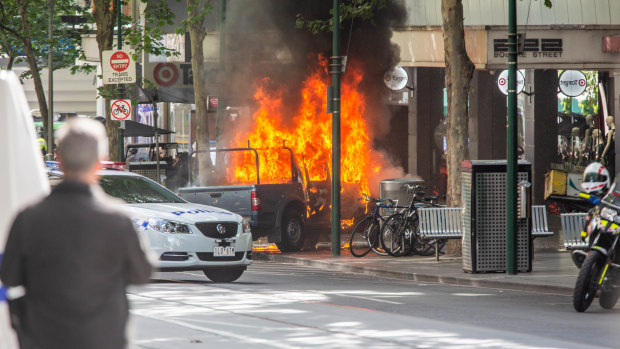 Hassan Khalif Shire Ali’s ute on fire in Bourke Street in 2018.