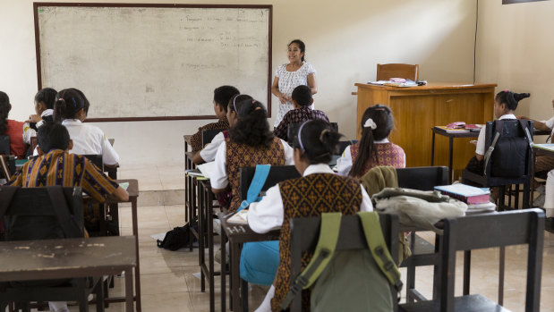 Students attend class in the city of Ende in East Nusa Tenggara.