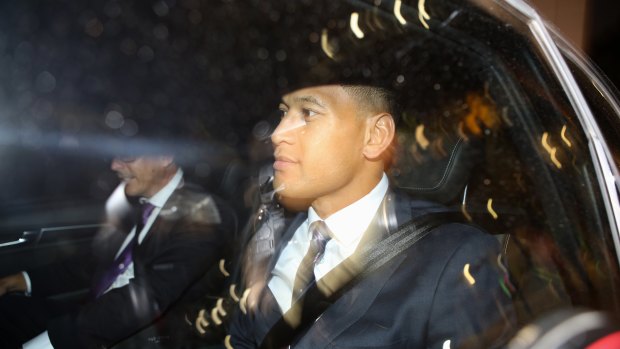 Crossing the line: Israel Folau leaves Rugby Australia headquarters after his hearing last Sunday. 