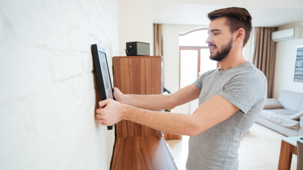Tenants in the ACT can now more easily modify their homes, including putting up picture hooks.