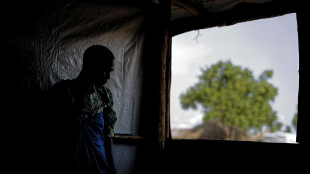 A South Sudanese refugee and 32-year-old mother, who said she was raped for several days by a group of soldiers before she was allowed to leave in 2017.