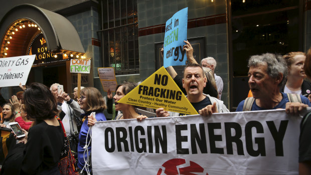 Climate activists and traditional owners protesting outside Origin Energy's AGM in Sydney.