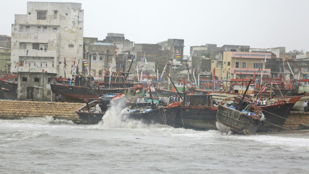 Fishing boats bombard on a wall due to heavy winds and huge waves in the Arabian sea at Veraval, Gujarat, India in June of last year.