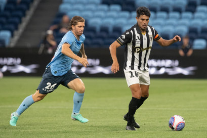 Former Macarthur Bulls captain Ulises Davila, right, was one of three players from the A-League club charged by NSW Police.
