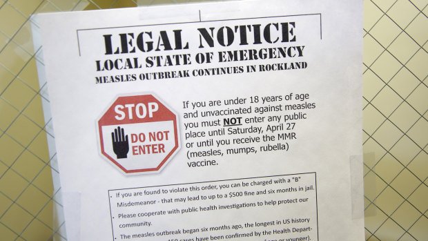 A sign explaining the local state of emergency is displayed at the Rockland County Health Department in Pomona, New York, on Wednesday.