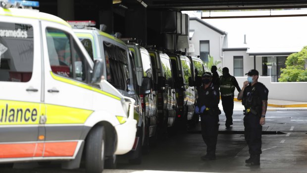 Ambulances at the ready to transport hotel quarantine guests from the Hotel Grand Chancellor in Brisbane on Wednesday.
