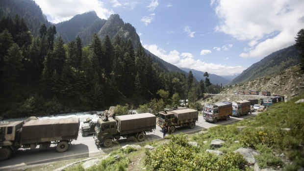 An Indian army convoy moves on the Srinagar-Ladakh highway at Gagangeer, north-east of Srinagar, Indian-controlled Kashmir on September 1.