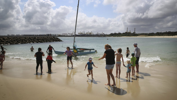 Concerned local residents opposed to a cruise ship terminal at Yarra Bay gather for a rally on the shores of the proposed site in Sydney's south.