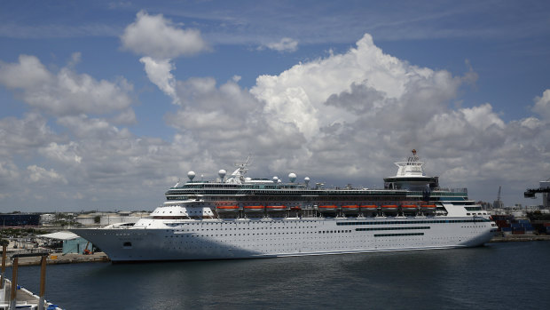 A Royal Caribbean cruise ship sets out at Port Everglades in June.