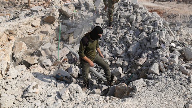 The aftermath of a US military operation targeting Islamic State leader Abu Bakr al-Baghdadi near the village of Barisha in Idlib province, Syria, last year.