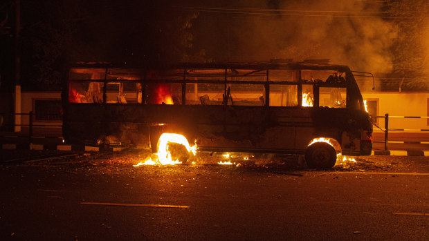 A bus stand in flames after demonstrators set it on fire as they protest against the Citizenship Amendment Bill (CAB) in Gauhati, India.