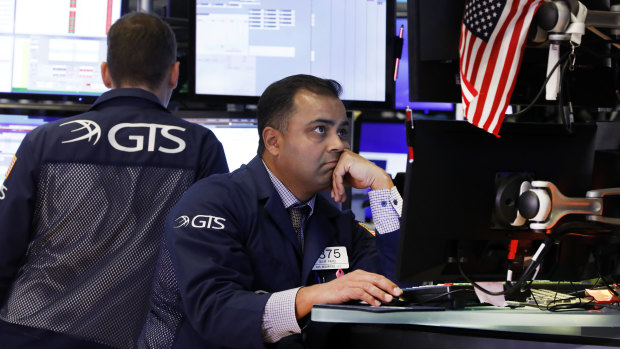 Wall Street edged lower after a rocky session.