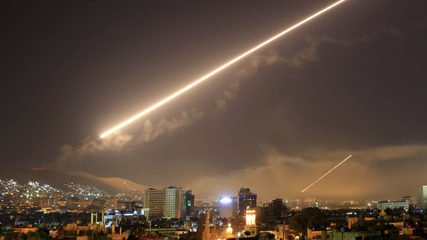 Damascus skies erupt with surface to air missile fire as the US launches an attack on Syria targeting different parts of the capital.