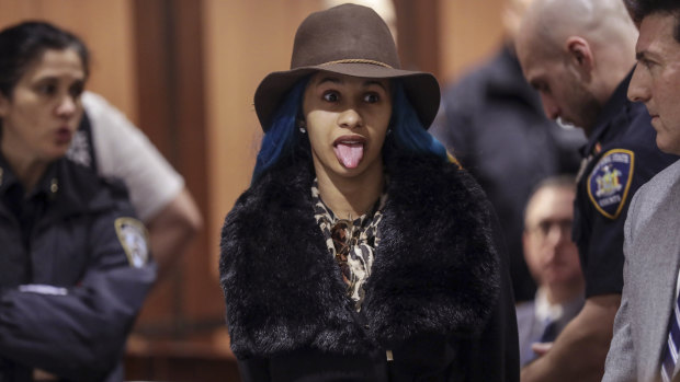 Rapper Cardi B, in fur, in court last year for assault charges during a melee in a strip club.