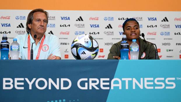 Nigeria coach Randy Waldrum with midfielder Rasheedat Ajibade at Wednesday’s press conference in Brisbane.