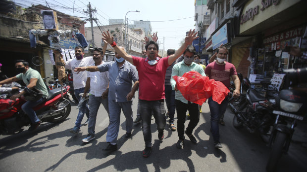 Indian protesters carry an effigy of Chinese President Xi Jinping in Jammu, India, on Wednesday.