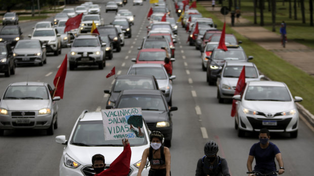 A caravan in protest against the government’s response in combating COVID-19 in Brasilia, Brazil. 