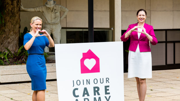 Innovation Minister Kate Jones and Premier Annastacia Palaszczuk launch the "care army" concept yesterday, urging Queenslanders to help neighbours aged over 65.