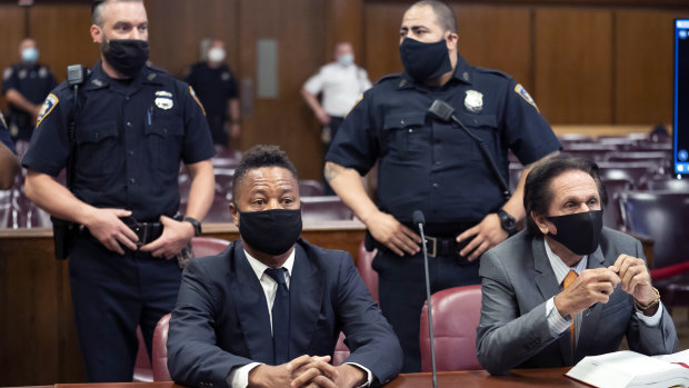 Cuba Gooding jnr, front left, sits at the defence table with his lawyer Marc Heller, during a hearing in New York.