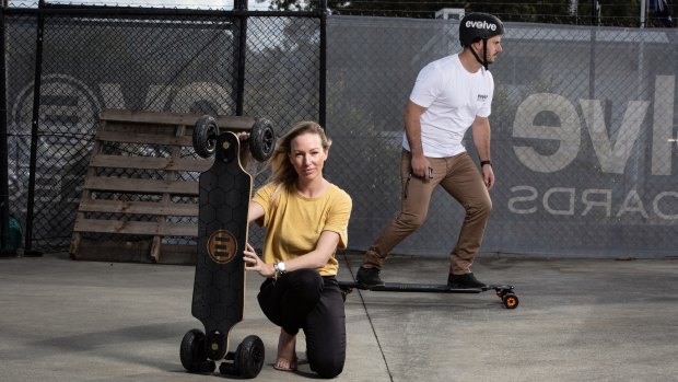 Fleur Anning and Evolve Skateboards chief executive Paul Harris at Evolve's factory on the Gold Coast. 