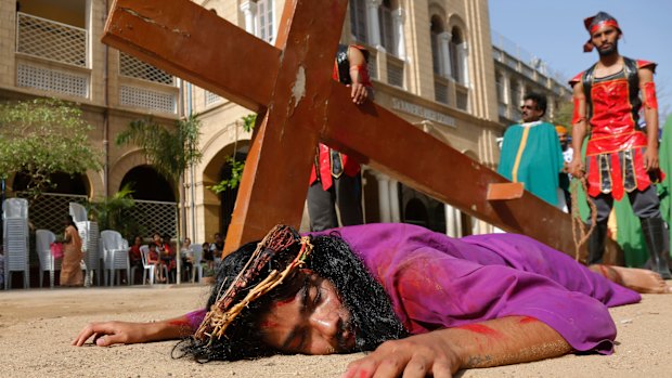 Students re-enact the crucifixion of Jesus Christ to mark Good Friday in Ahmedabad, India.