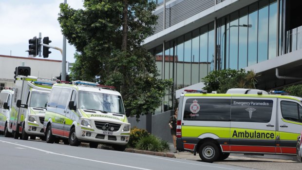 Ambulances ready to transport hotel quarantine guests from the Hotel Grand Chancellor.