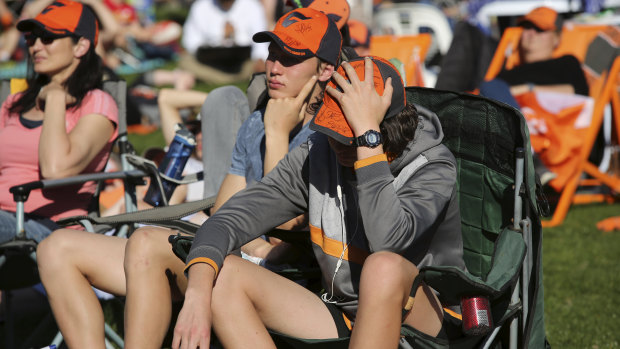 Disappointed GWS fans at the live site at Sydney Olympic Park in Sydney's west.